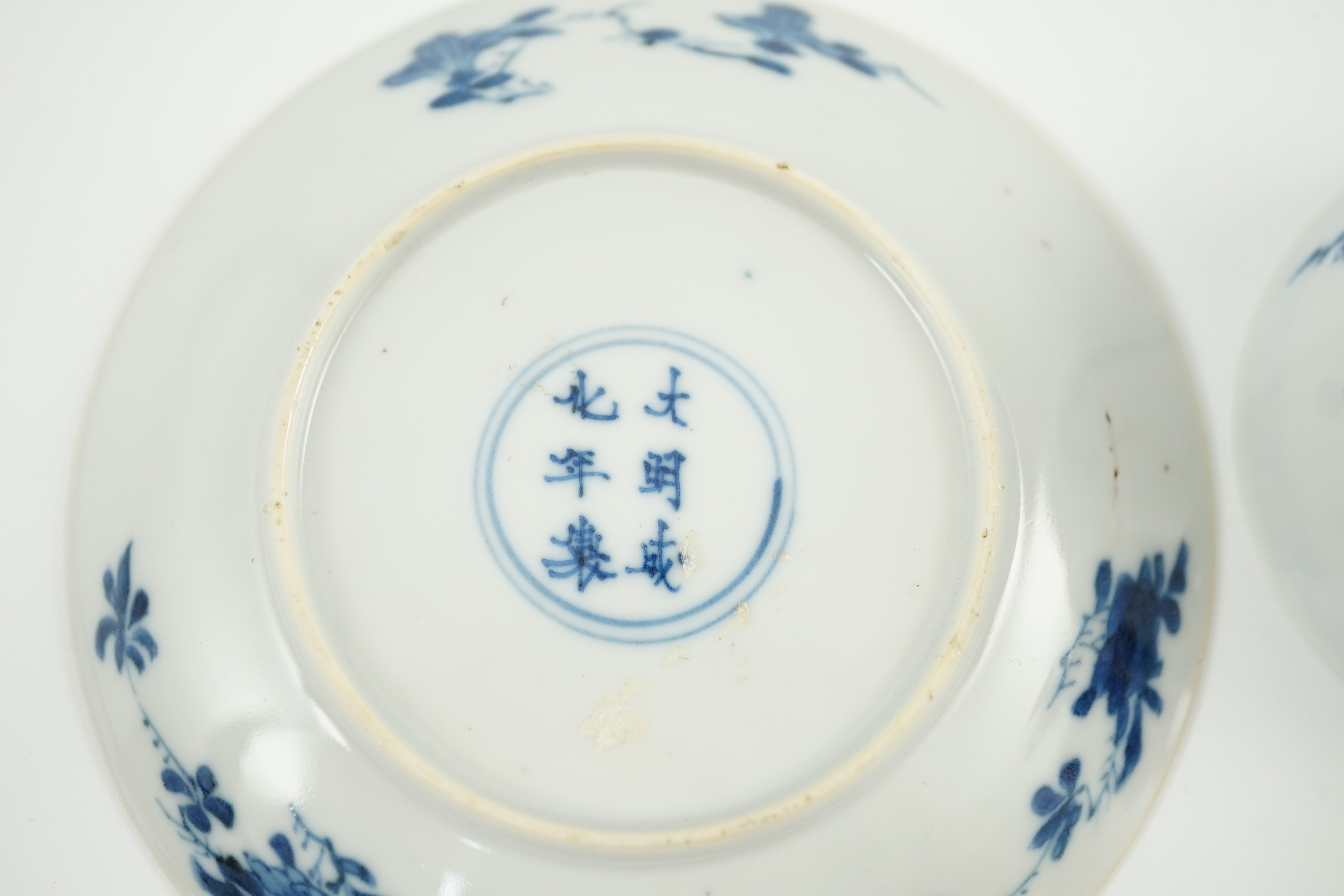 A Chinese blue and white tea bowl and saucer, Chenghua mark but Kangxi period, 9.7cm diameter